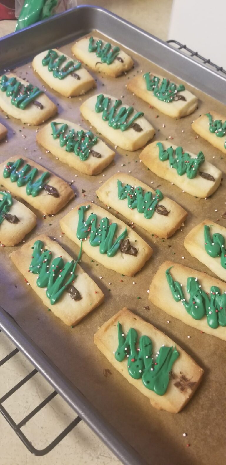 Finished shortbread cookies served with a hot cup of espresso