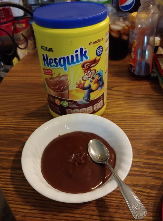 Creamy chocolate custard for a homemade Nesquik Chocolate Pie.