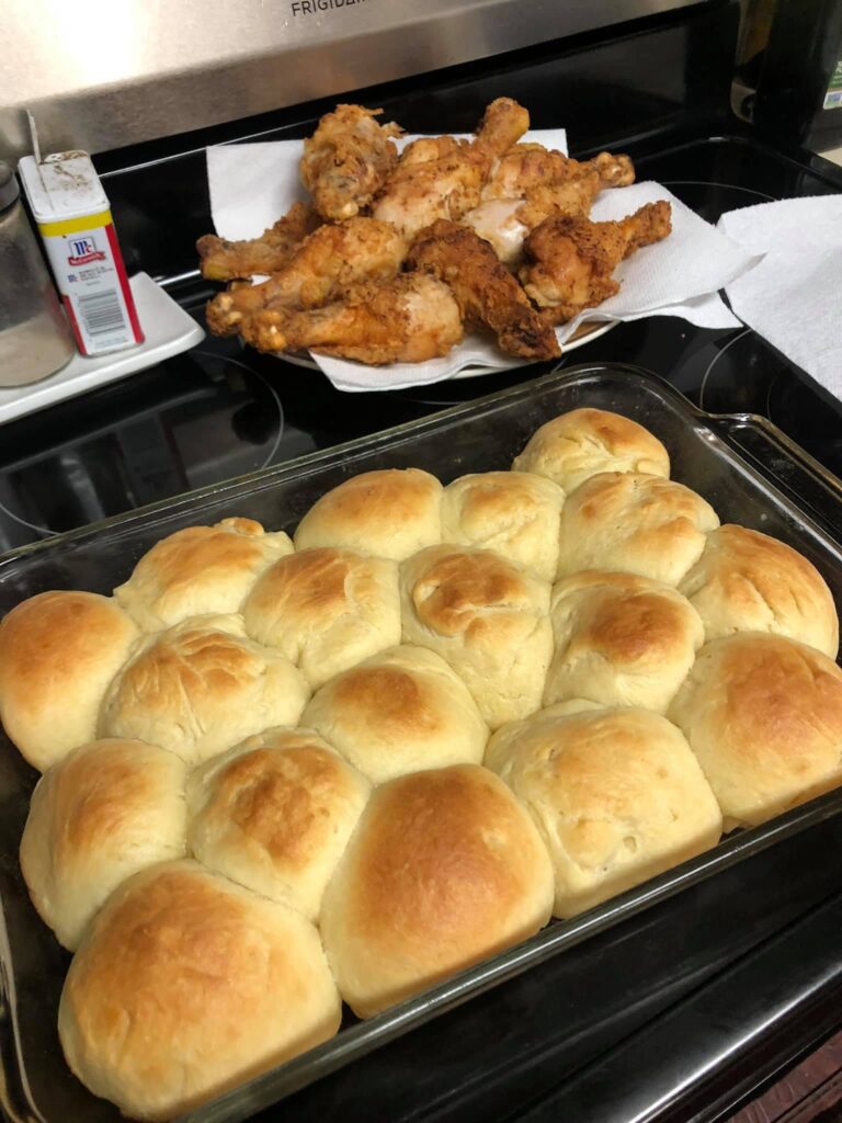 Fluffy homemade Southern style buttery buns fresh out of the warm kitchen oven.
