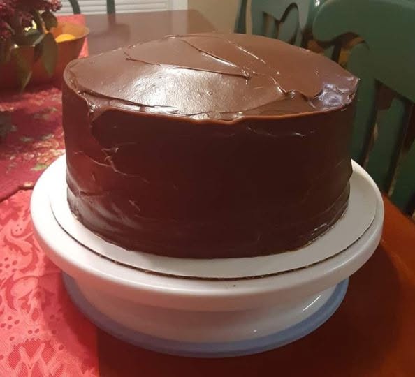 A real, unedited photograph of a vintage chocolate cake slice